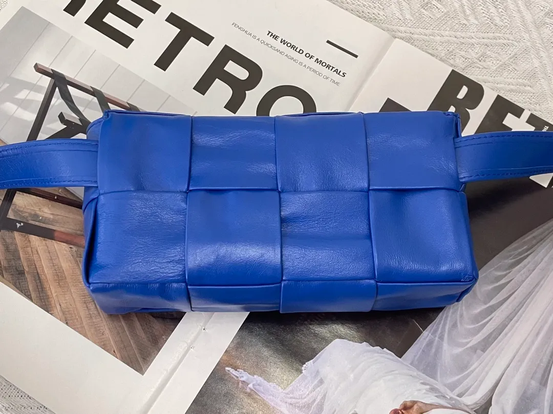 #𝐓𝐇𝐄 𝐁𝐄𝐋𝐓 𝐂𝐀𝐒𝐒𝐄𝐓𝐓𝐄 Checkered waist bag cassette has an updated version🆕The waxed cowhide material is very light and shiny, has a cool feeling, and has the same high-end touch as always. ⚠️The second-generation upgraded version has a long strap of 136cm, tall people can also wear it cross-body at will It is also suitable for boys. It is suitable for couples. It can be used as a handbag, waist bag, crossbody or shoulder bag. It’s small and exquisite, but packs a punch: 💄lipstick 🕶️sunglasses, etc.⋯pack it all! It continues the square shape of the cassette bag and does not deform after loading. It has a very concave shape! Model: 6815# S18.5x5x9.5